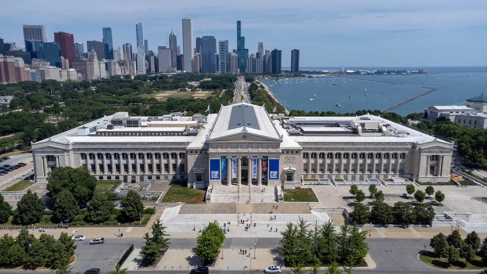 Aerial view of the Field Museum with the Chicago skyline and Lake Michigan behind