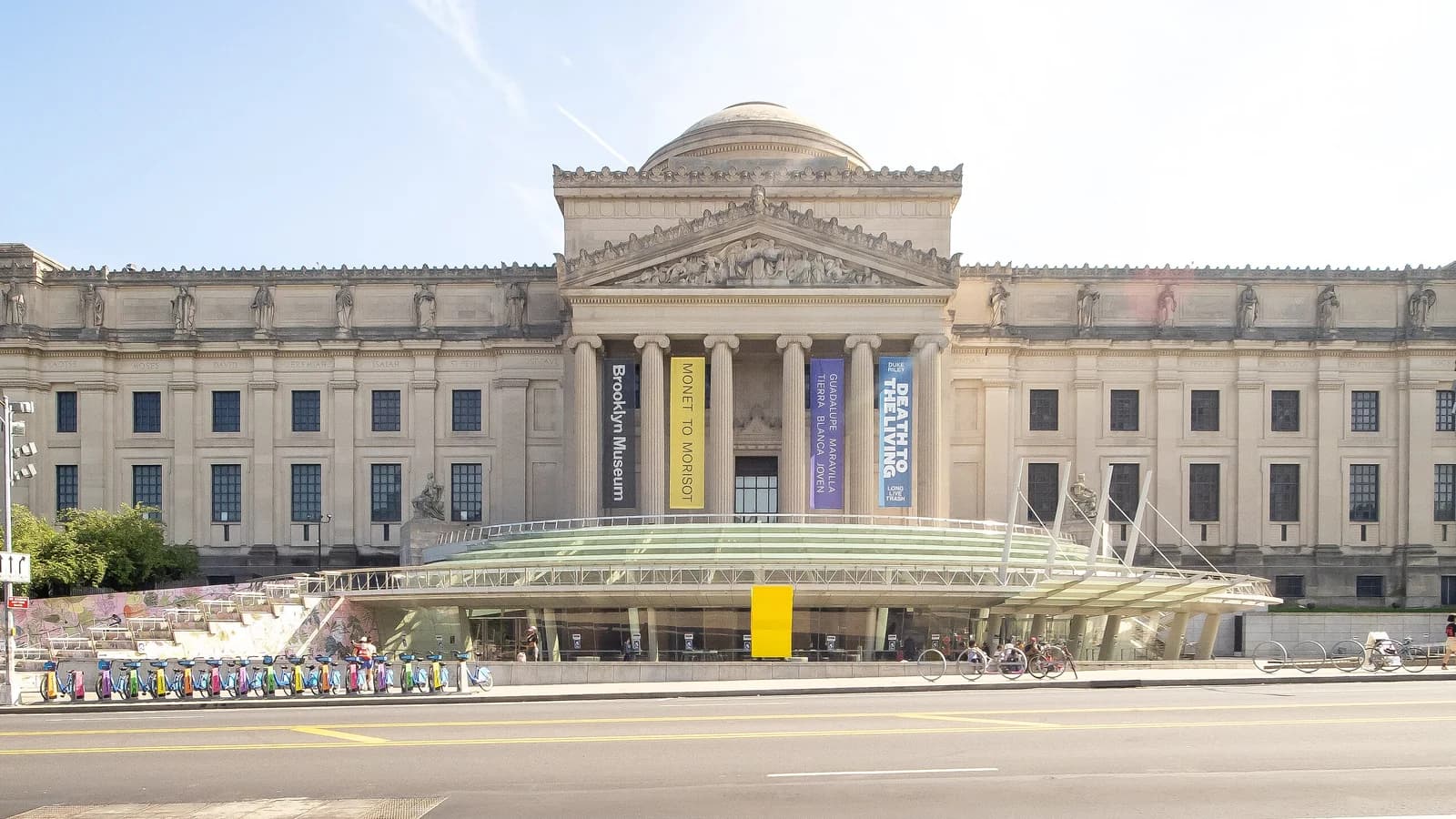 Beaux-Arts facade of the Brooklyn Museum on Eastern Parkway with its columned portico, dome and glass entrance pavilion