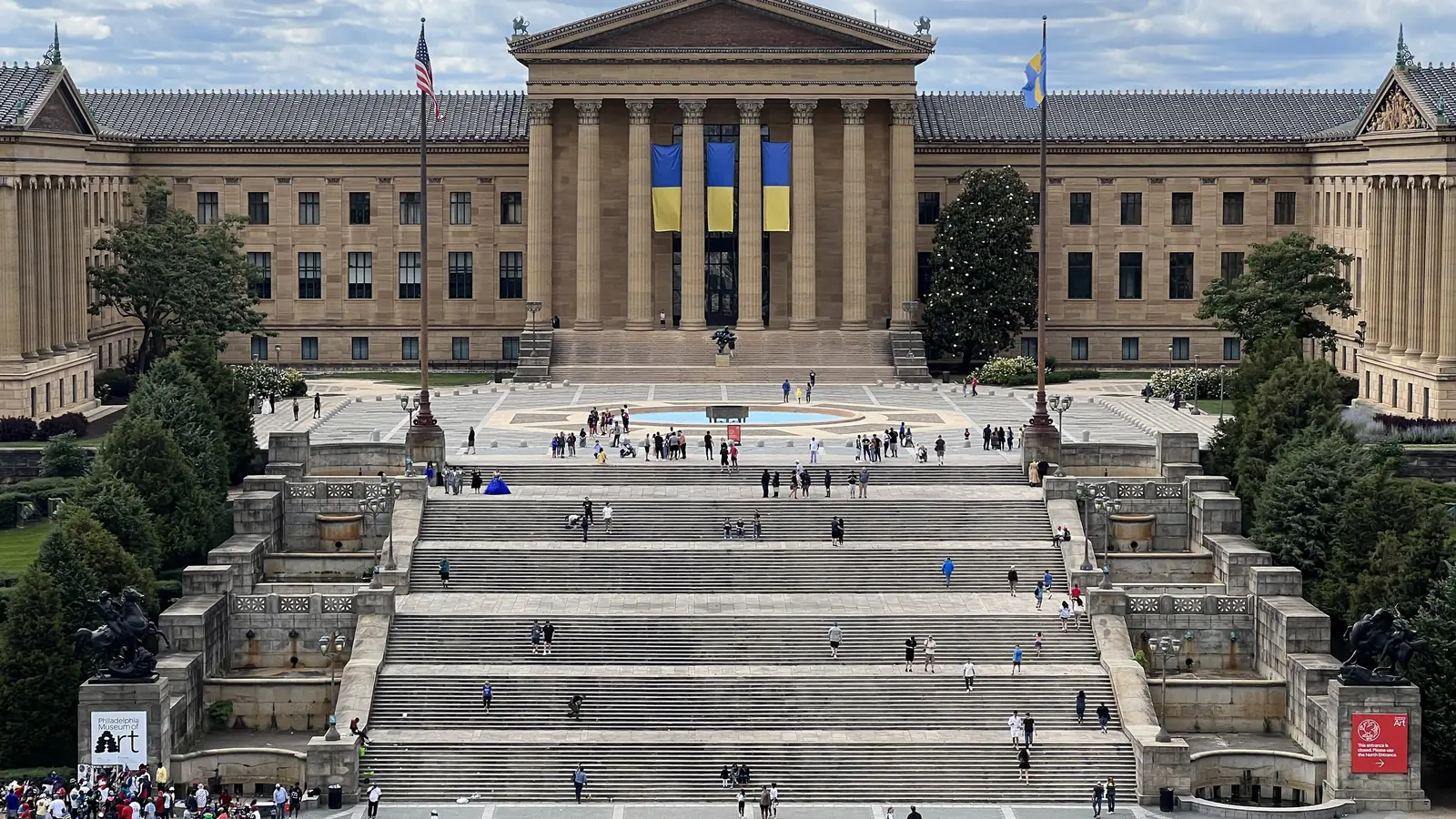The Rocky Steps rising to the columned Philadelphia Museum of Art under a blue sky